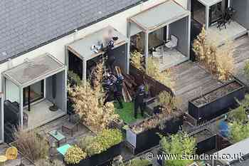 Footage shows moment police arrest wanted man while he slept on roof