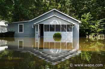 At least 6 people have died from days of storms and record-setting flooding in Indiana