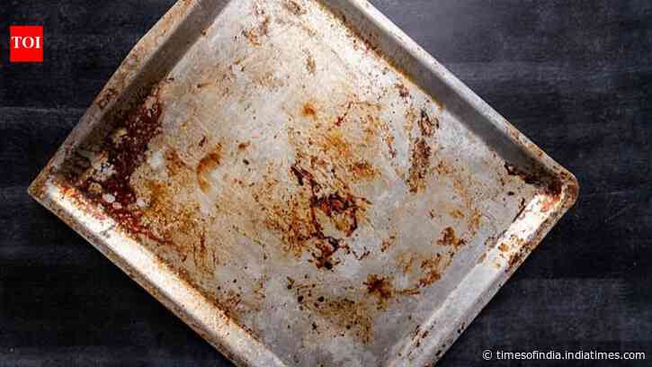 Clean Brown Sticky Baking Sheets: Oil polymerization explains dark pans; natural methods restore shine