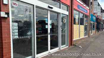 Woman arrested after windows smashed at Cambridgeshire shop