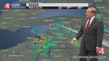Lingering morning clouds break for afternoon sun