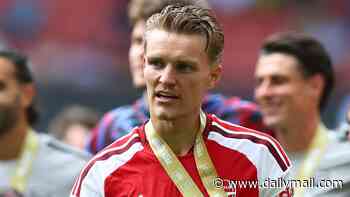 'We want more!': Martin Odegaard says winning the Premier League again is not enough for Arsenal this season - as they target a Double or Treble