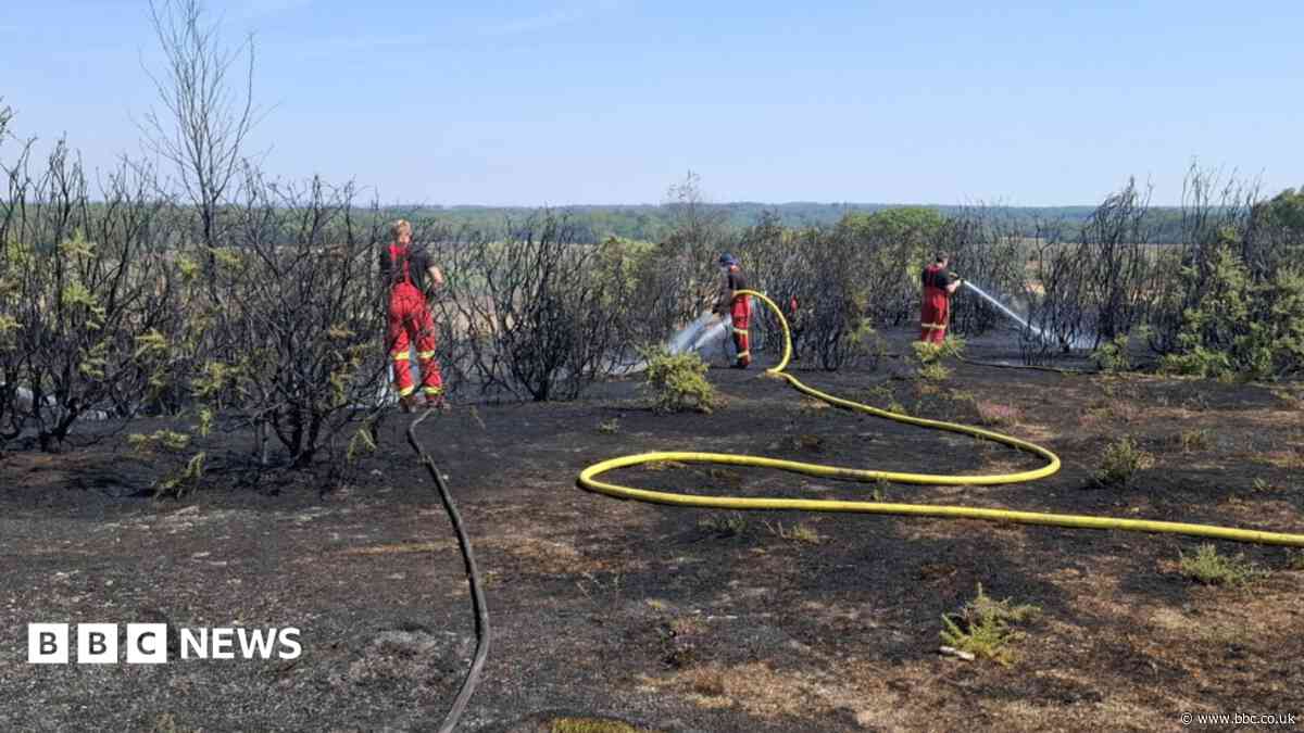 Firefighters tackle wildfire for eighth day