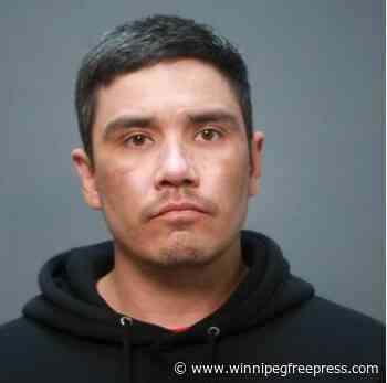 Man charged, suspect sought in commercial break-in spree