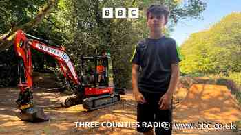 Young bikers block digger from 'destroying' jumps