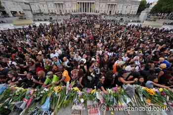 Mourners gather in Trafalgar Square for a vigil honouring former Cambridge professor Jason Arday
