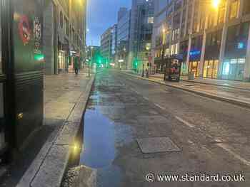 Rain finally falls in London! Capital rejoices as showers hit city with more wet weather to come