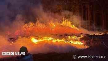 Crews under 'immense pressure' from wildfires