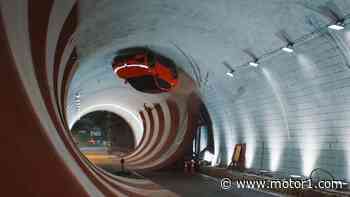 Watch An EV SUV Drive Upside Down In 360° Tunnel Loop