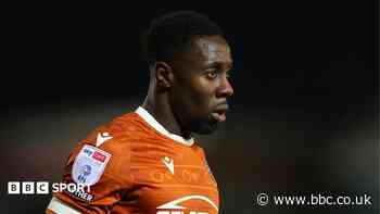 Wimbledon sign defender Yiadom on short-term deal