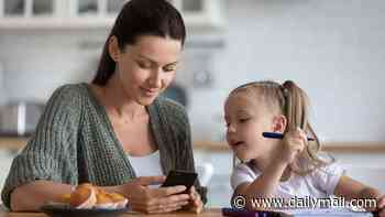 Scrolling on your phone in front of a child is worse for their brain than giving them a screen, study finds