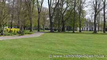 Police rush to 'men carrying axe' in Cambridge park