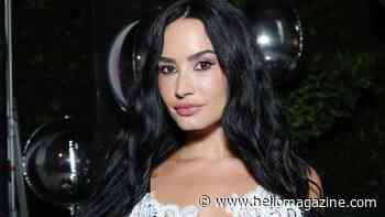 Tatted-up Demi Lovato sizzles as she shows off killer abs in tiny string bikini