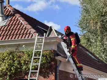 Brand onder dakgoot in Appingedam