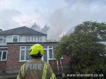 Fire rips through house in north London with roof completely destroyed