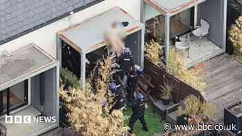 Man charged after rooftop stand-off ends