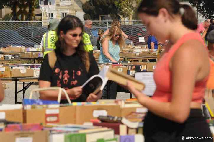 Head outside to browse and buy bargain books at Chilliwack Rotary sale