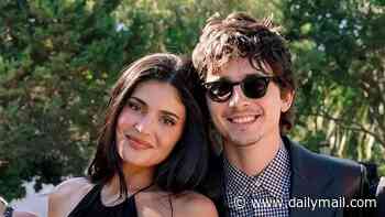 Kylie Jenner risks upstaging bride Jordyn Woods in wildly revealing gown as she poses with covered-up beau Timothee Chalamet at wedding