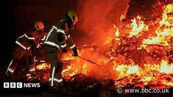 Fire crews hailed for 'huge effort' as blazes soar