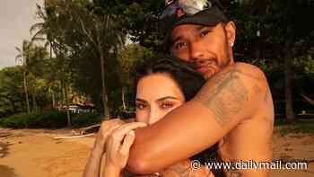Lewis Hamilton cuddles up to bikini-clad girlfriend Kim Kardashian as he flaunts their relationship in first main Instagram post