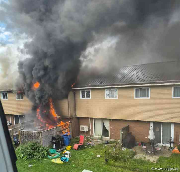 Two families, 10 children unhoused following townhouse fire