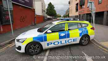 Robbery suspect in hospital after police swoop in Moss Side