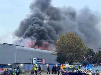 Firefighters tackle huge blaze at a waste facility in Deptford