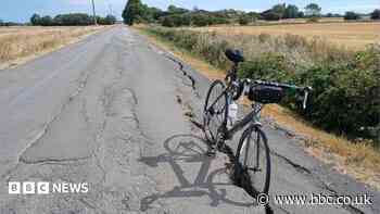 Badly cracked road means 'no need for bike stands'
