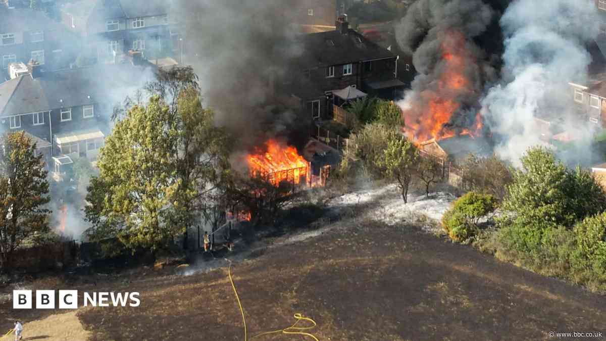 Two on bail after devastating blaze destroys homes