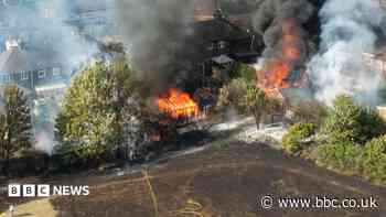 Two on bail after devastating blaze destroys homes