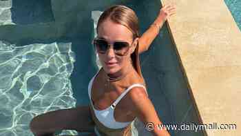 Amanda Holden, 55, looks incredible as she poses in a skimpy white bikini on sun-soaked business trip to Crete