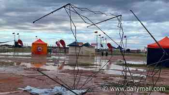 Chaos as thousands of ticket holders at Aussie festival are turned away after floods turn site into a mud pit