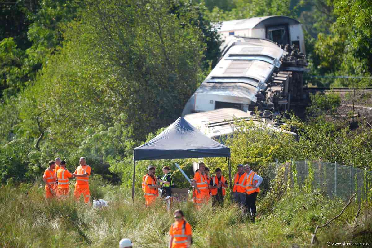 Train derailment probe focusing on hot weather as track appears to have buckled