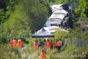 Train derailment probe focusing on hot weather as track appears to have buckled