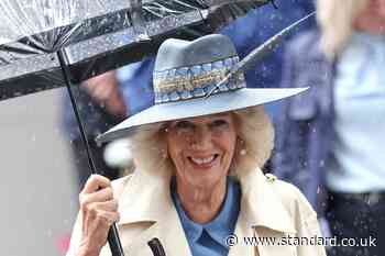 Queen braves rain to enjoy a day at the races in York