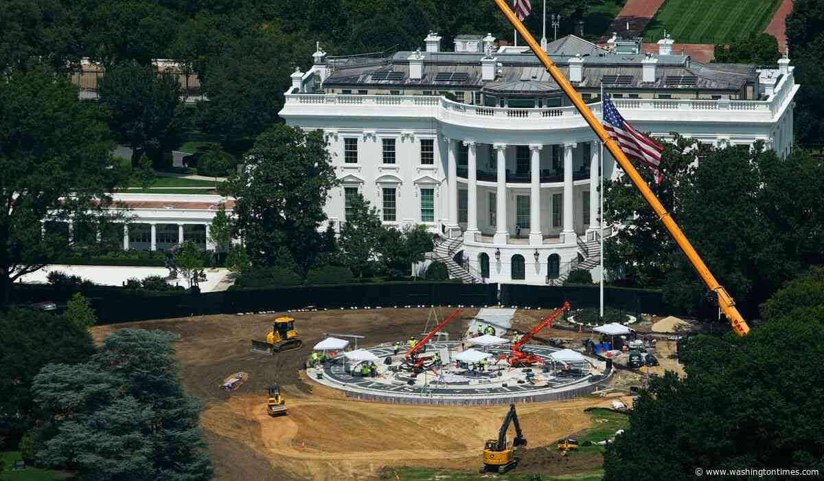 Trump signs marble slab as part of new White House helipad