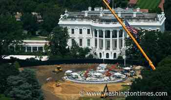Trump signs marble slab as part of new White House helipad