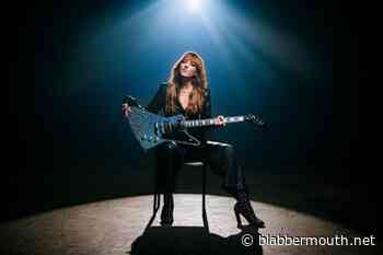 HALESTORM's LZZY HALE And EPIPHONE Unveil Explorer Custom Guitar In Black Diamond Holographic Sparkle