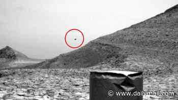 Mysterious 'flying' object in NASA Mars photo sparks theory of extraterrestrial life on the Red Planet