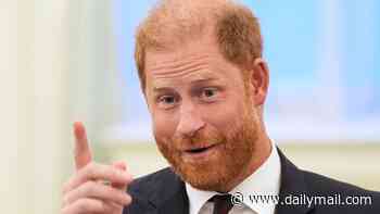 Beaming Harry looks delighted as he breaks cover just hours after return to the UK was revealed (and shares a laugh with a fellow red head)