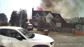 Doorbell captures flames leaping above home's roof