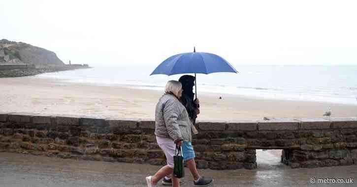 Heavy rain sweeping across UK sparks fears of flash flooding
