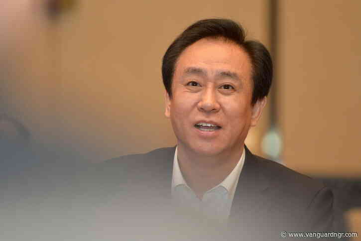 China jails Evergrande founder for life, fines firm over $2bn