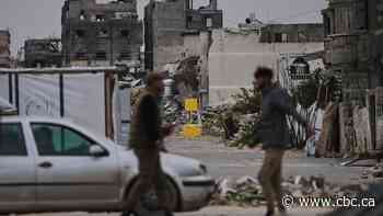 As Israel’s military advances its yellow line, Gazans fear they’re being pushed to the sea