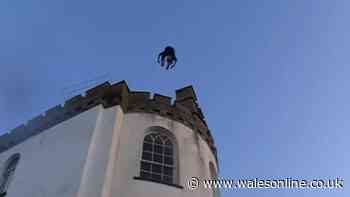 Police called after people jump off building in Tenby