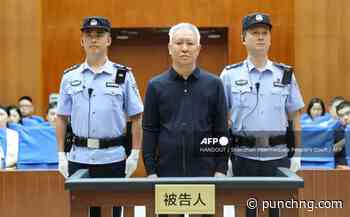 China jails Evergrande founder for life, fines firm more than US$2bn