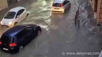 Roads turn to rivers as Italian tourist town is hit by flash floods - with Europe bracing for storms after brutal heatwaves