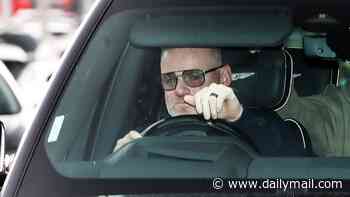 Wayne Rooney shows off the results of his nose job and models trendy new specs as he and wife Coleen leave the football training ground