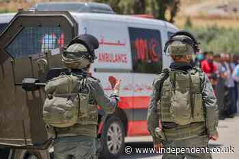Palestinian nurse shot and ambulance pelted with stones by Israeli settlers in West Bank, says aid group
