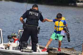 Youths join police for a day of fishing at Whitewater Lake